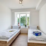 Apartment Prora - Stilvolle Ferienwohnung mit Meerblick, E-Ladesaeule und Gemeinschaftssauna - Arkonas Strandperle Binz